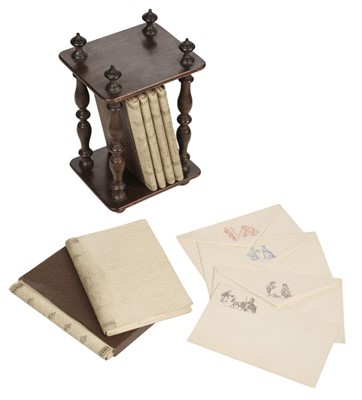 Lot 175 - Stationery Set. A child's set of notecards and envelopes in wooden stand, circa 1890s