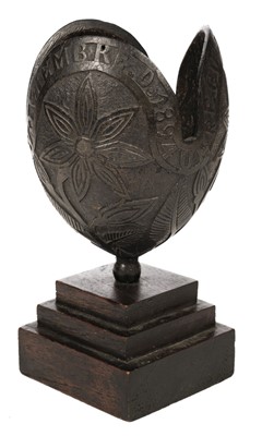 Lot 260 - Coconut. A 19th century carved coconut