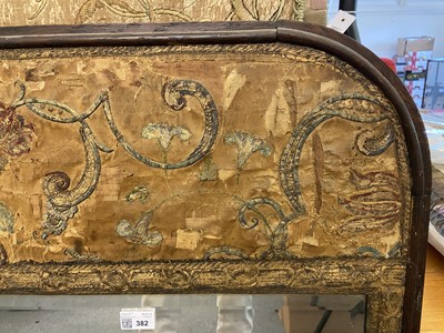 Lot 382 - Embroidered mirror. A mirror set with early embroidery, 1580-1600