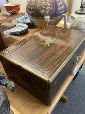 Lot 281 - Vanity Box. A 19th-century rosewood box containing silver top bottles