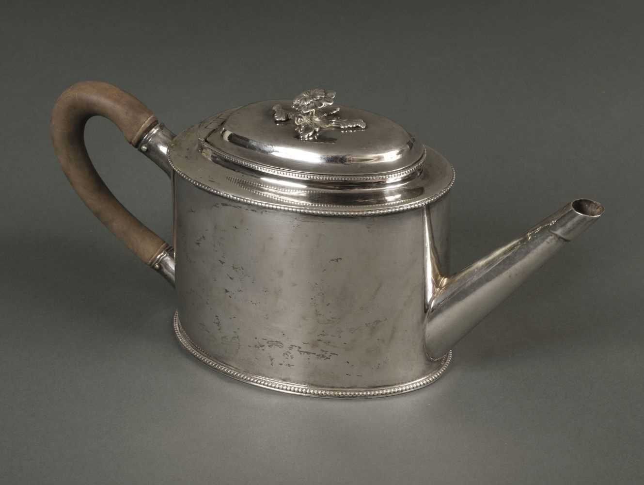 Lot 219 - Teapot. A George III silver teapot by William Turton, London 1783