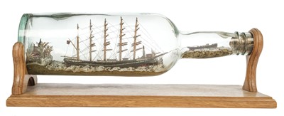Lot 335 - Ship in a Bottle. A Victorian ship in a bottle