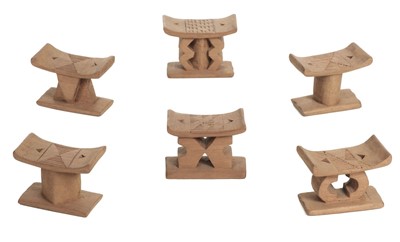 Lot 316 - Ashanti. A large collection of miniature wooden stools