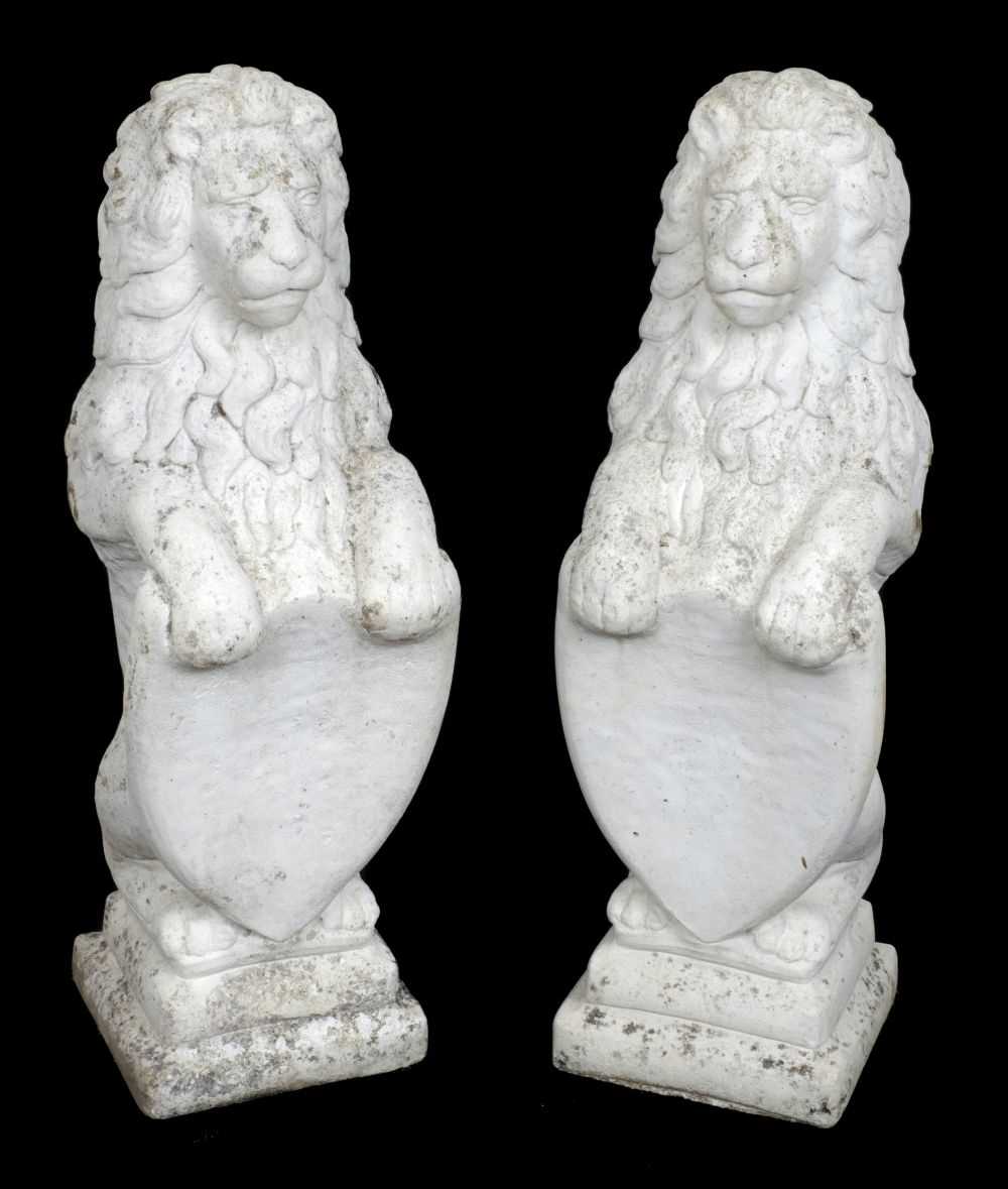 Lot 258 - Lions. A pair of reconstituted stone lions