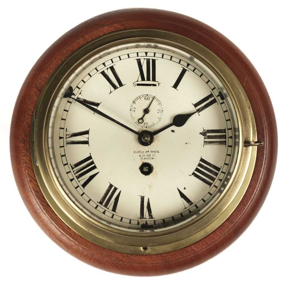 Lot 320 - Bulkhead Clock. A ship's clock by Dobbie