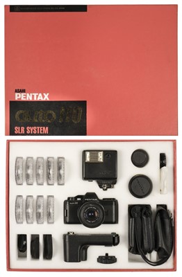 Lot 593 - Pentax Auto 110 SLR System sub-miniature film camera kit with 3 lenses and 9 filters