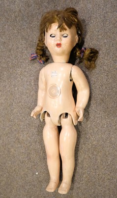 Lot 514 - Dolls. A bisque head doll, French, early 20th century, & other dolls and jigsaws