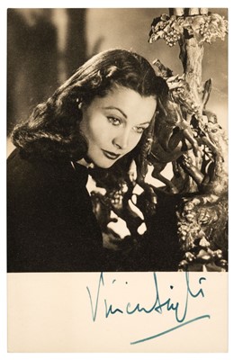 Lot 948 - Leigh (Vivien, 1913-1967). A fine vintage black and white photographic postcard signed, 1947