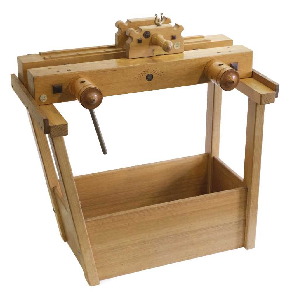 Lot 354 - Laying press & tub. A modern hardwood laying press by F.H. Wiesner of Toowoomba, Australia