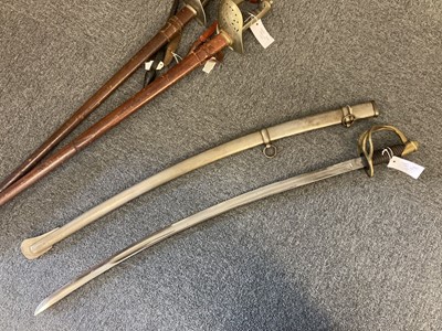Lot 351 - Reproduction Swords. An American 1862 Cavalry Sabre and two others