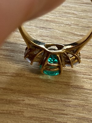 Lot 374 - Emerald Ring. An 18ct gold emerald and diamond ring