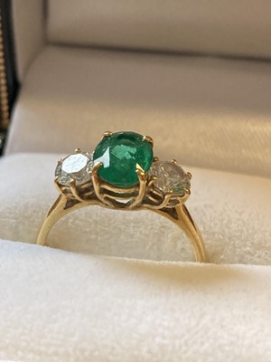 Lot 374 - Emerald Ring. An 18ct gold emerald and diamond ring