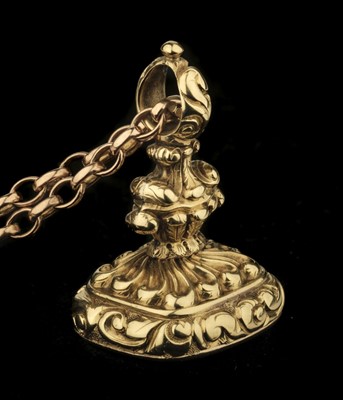 Lot 377 - Fob. A Victorian yellow metal fob on a 9ct gold chain