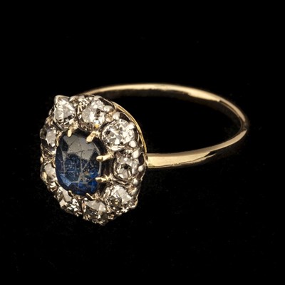 Lot 393 - Sapphire & Diamond Ring. A Victorian 14k diamond and sapphire cluster ring