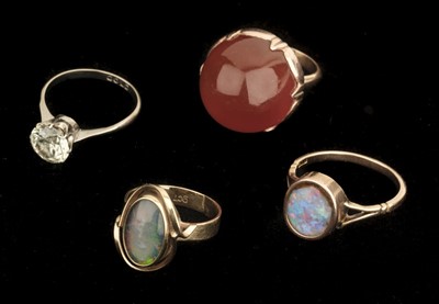 Lot 370 - Dress Rings. A 15ct gold opal ring and other