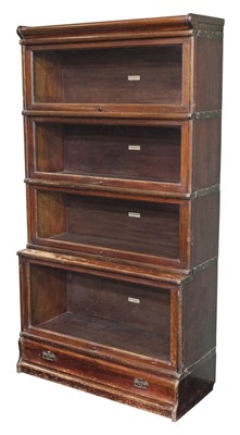 Lot 311 - Bookcase. A 1920s Globe Wernicke stained beech 4-tier bookcase