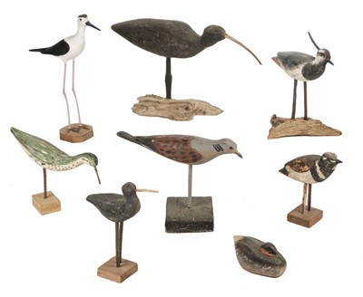 Lot 94 - Bird decoys. A group of 8 French painted wooden bird decoys, 1950s