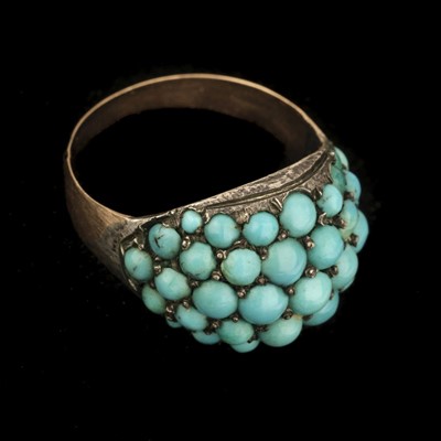 Lot 387 - Turquoise Ring. A Victorian yellow metal ring