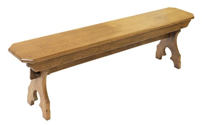 Lot 517 - Arts and Crafts. An early 20th-century golden oak bench