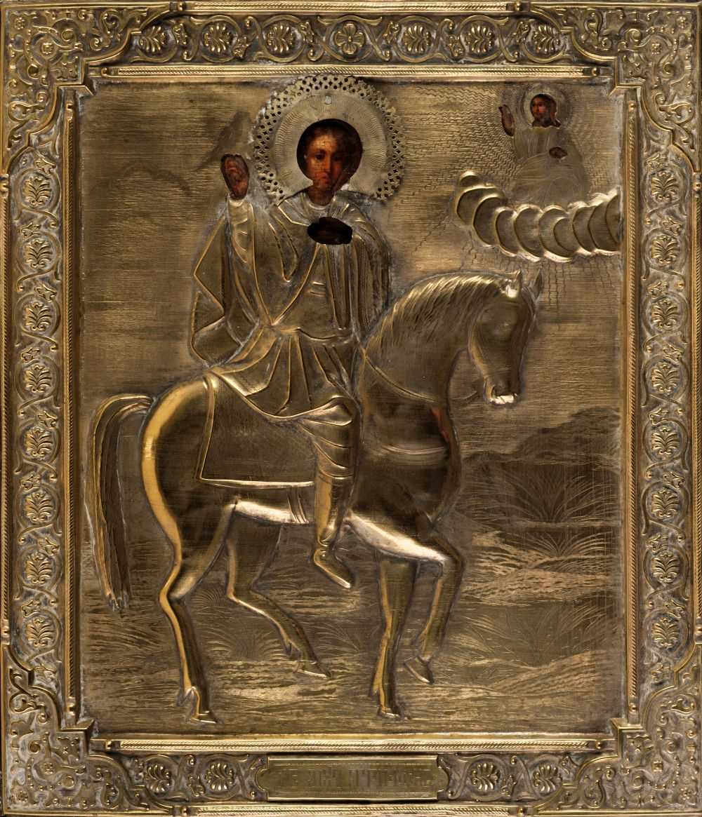 Lot 123 - Russian icon of Saint Tryphon on a horse with angelic figure to upper right corner, 19th-century