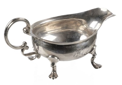 Lot 436 - Sauce Boat. A George III silver sauceboat, makers mark worn but London 1793