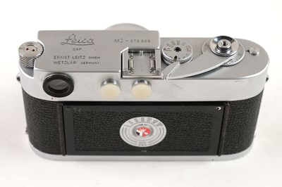 Lot 187 - Leica M2 rangefinder camera with three lenses, MR lightmeter and other accessories