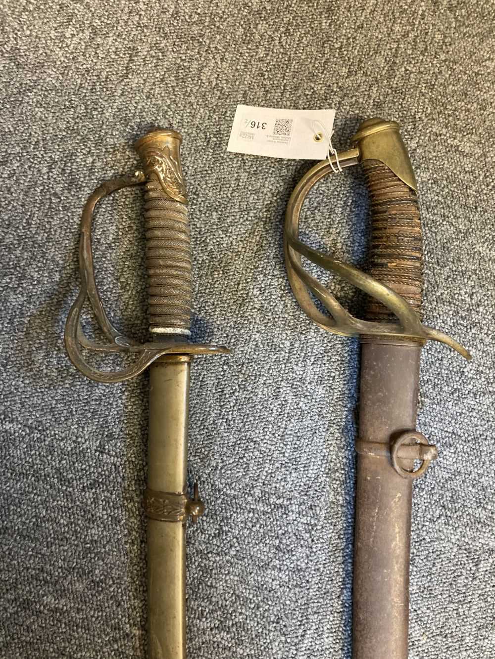 Lot 316 - Swords. A 19th century German cavalry sword plus American sword