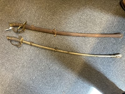 Lot 316 - Swords. A 19th century German cavalry sword plus American sword