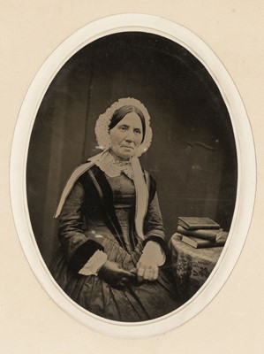 Lot 84 - Tintypes. Portrait of a seated middle-aged woman, c. 1880