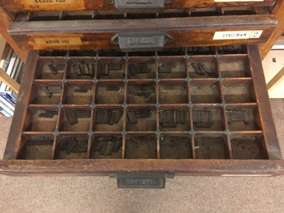 Lot 453 - Type cabinet. An 18 drawer Caslon type cabinet with brass type