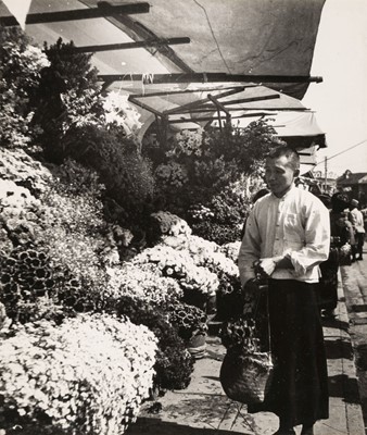 Lot 44 - China. A Man buying Flowers in Shanghai, c. 1930, gelatin silver print