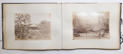 Lot 118 - Japan. An album containing 60 mounted photographs of scenes in Japan, c. 1880