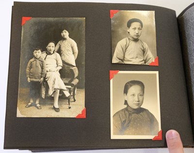 Lot 27 - China. A Chinese family photograph album, c. 1910s/1960s