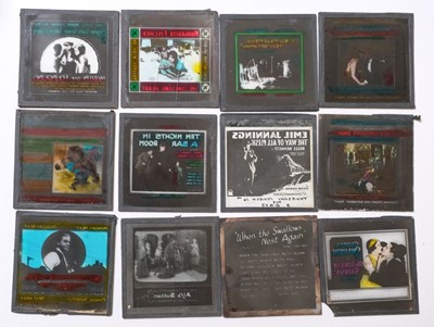 Lot 210 - Magic Lantern Slides. A group of 52 mostly hand-coloured lithographic and some photographic