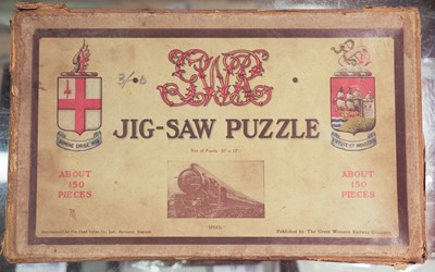 Lot 310 - Jigsaw Puzzles. A collection of five GWR jigsaw puzzles, early 20th century