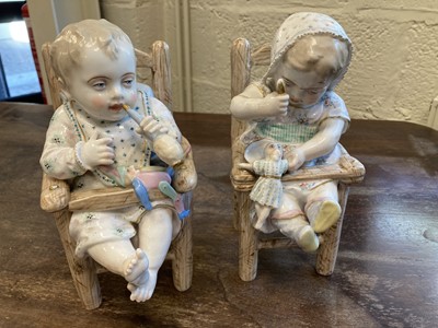 Lot 76 - Porcelain Infants. A pair of Edwardian porcelain figures