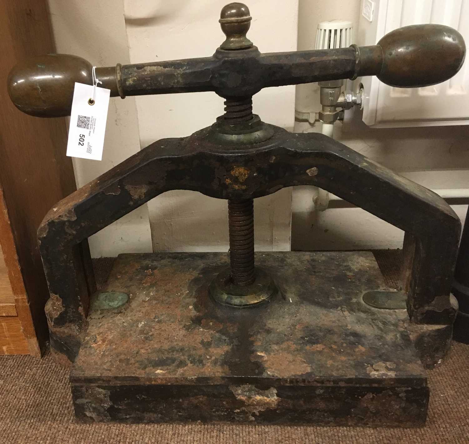 Lot 63 - Book press. A cast iron book press