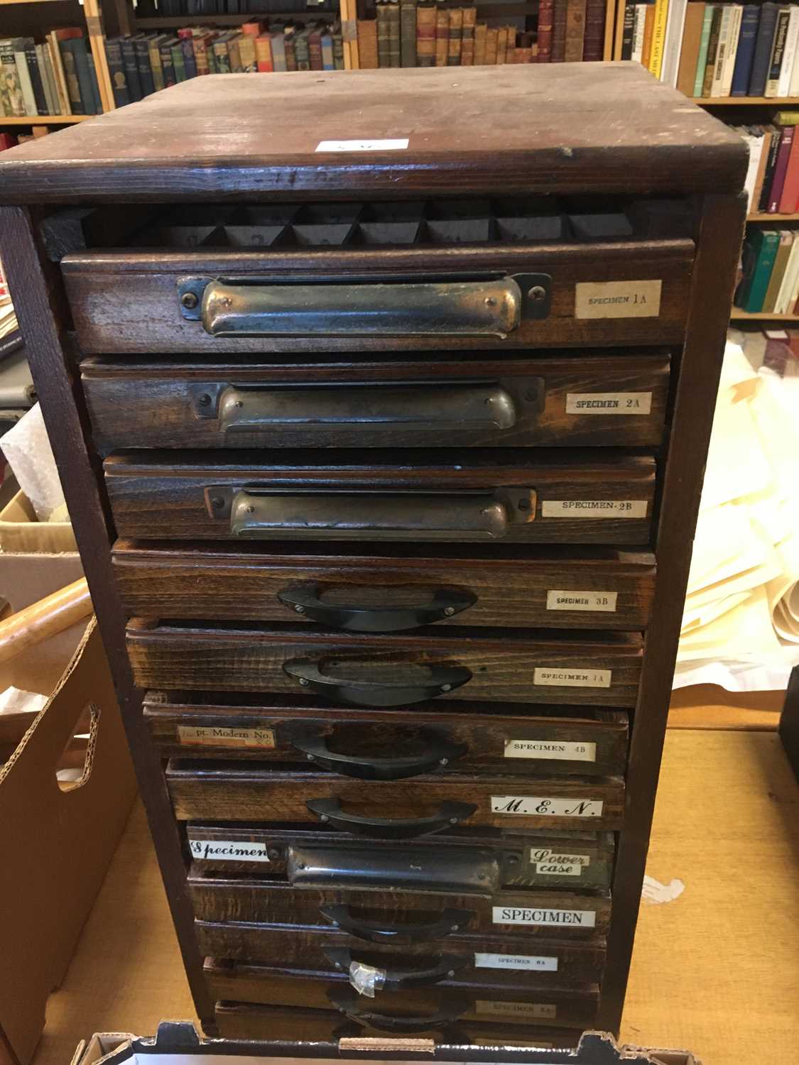 Lot 456 - Type cabinet. A 12 drawer type cabinet with selection of brass type