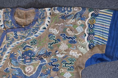 Lot 141 - Chinese Dragon Robe. A kesi silk nine-dragon robe, late Qing Dynasty