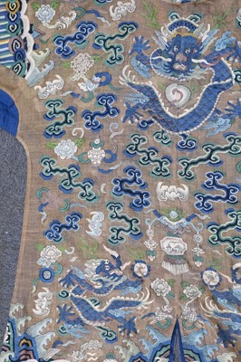Lot 141 - Chinese Dragon Robe. A kesi silk nine-dragon robe, late Qing Dynasty