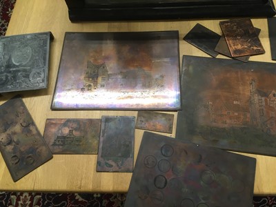 Lot 489 - Printing plates. A collection of copper printing plates, alloy printing blocks and alloy type