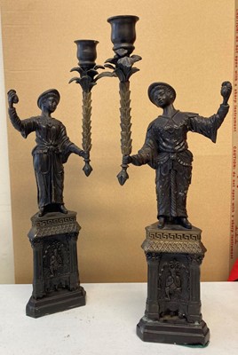 Lot 18 - Candle Stands. A pair of patinated brass candle stands