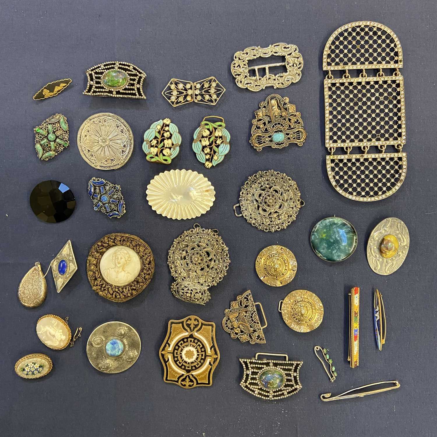 Lot 39 - Costume Jewellery. An Edwardian silver belt buckle and other items