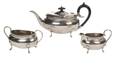 Lot 85 - Teaset. A silver 3-piece teaset by Kemp Brothers, London 1939
