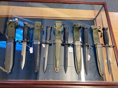 Lot 409 - Fighting Knife. A collection of five American fighting knife / bayonets