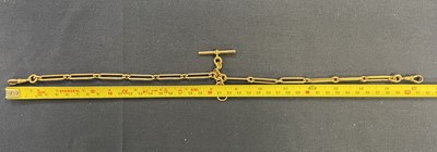 Lot 71 - Watch Chain. An Edwardian 18ct gold trombone link watch chain, 57.8g