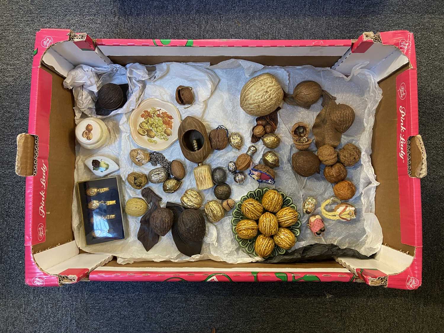Lot 35 - Walnuts. A collection of walnut memorabilia,
