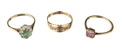 Lot 67 - Rings. An 18ct gold cluster ring and two further 18ct gold rings