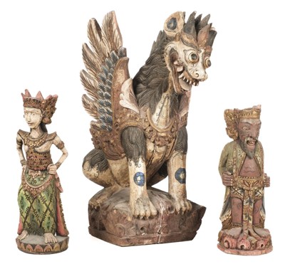 Lot 93 - Balinese. An early 20th century Balinese carved wood figure of Garuda and others