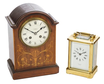 Lot 17 - Carriage Clock. A modern brass carriage clock by Clermont London